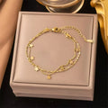 Bracelet à breloques fleurs doré – modèle 1
