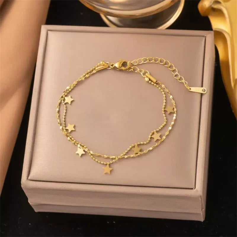 Bracelet à breloques fleurs doré – modèle 1
