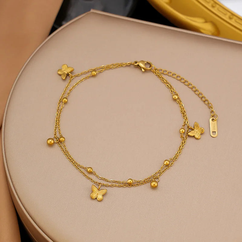 Bracelet à breloques fleurs doré – modèle 2