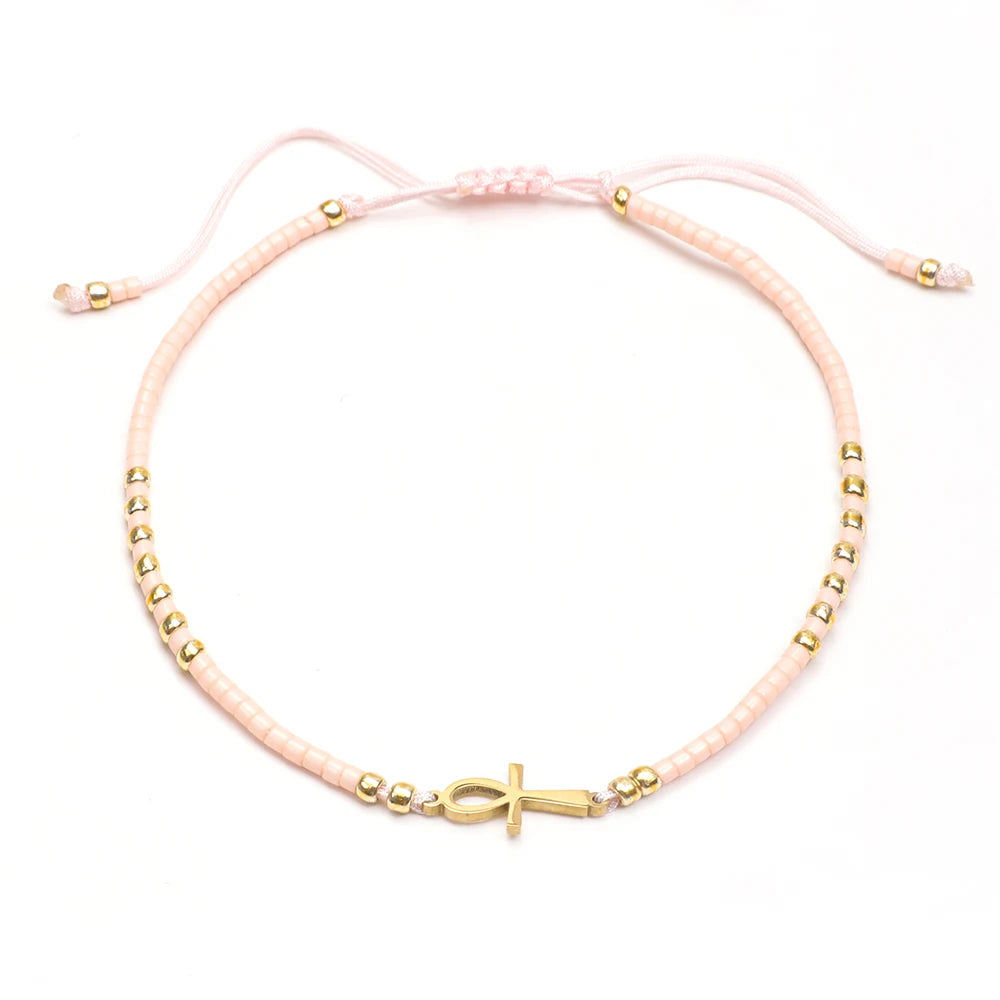 Bracelet fin perles de verre colorées – Rose