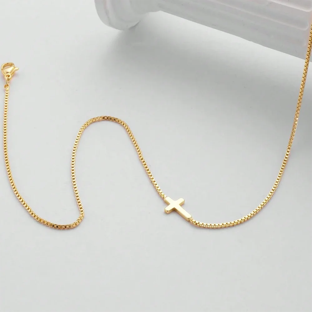 Mini collier pendentif croix doré - Harmonia Ibiza