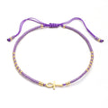 Bracelet fin perles de verre colorées – Violet