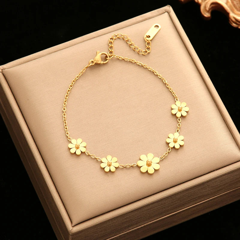 Bracelet à breloques fleurs doré – modèle 10