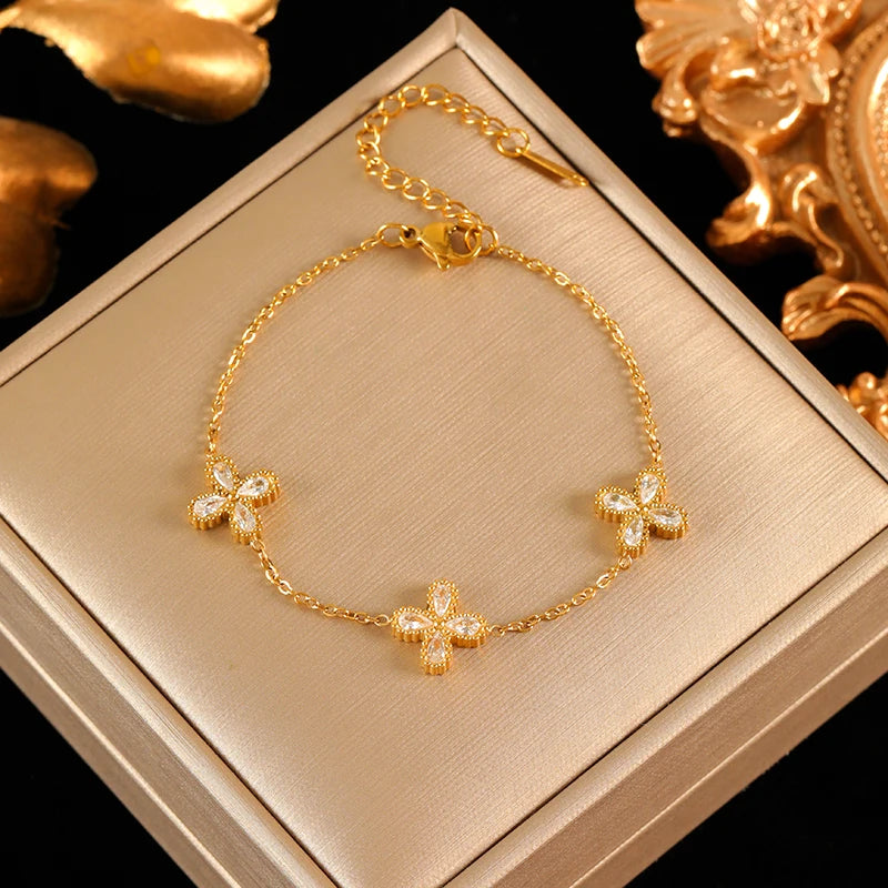 Bracelet à breloques fleurs doré – modèle 6
