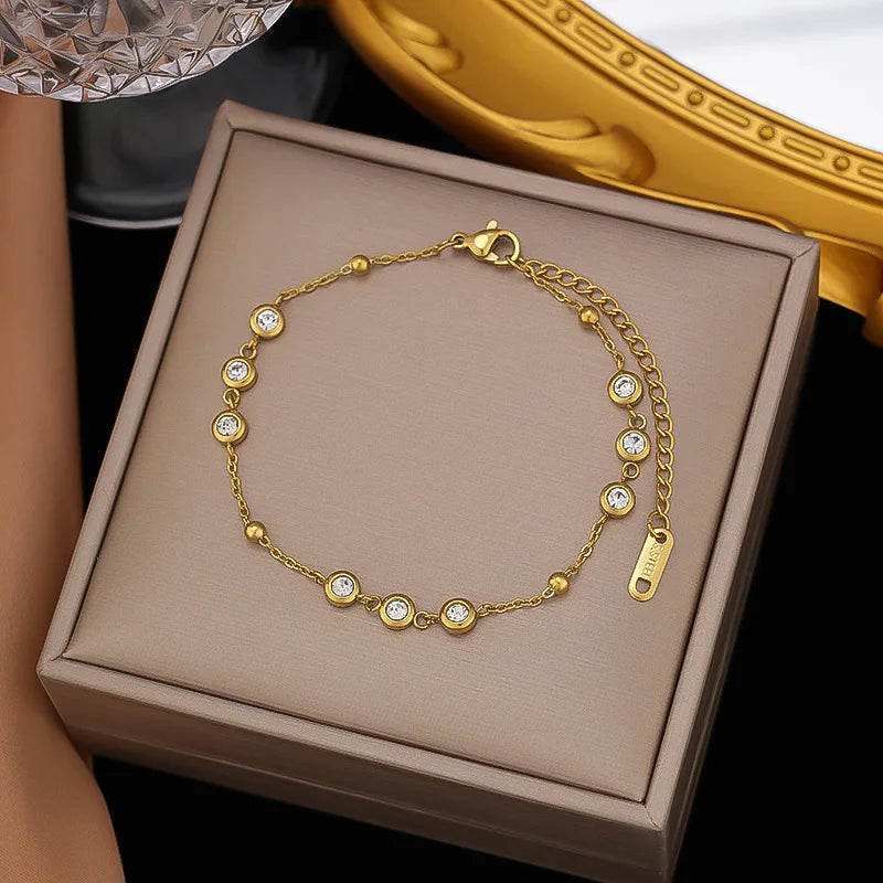 Bracelet à breloques fleurs doré – modèle 3