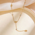 Collier long en Y maillons ovales – Doré avec strass