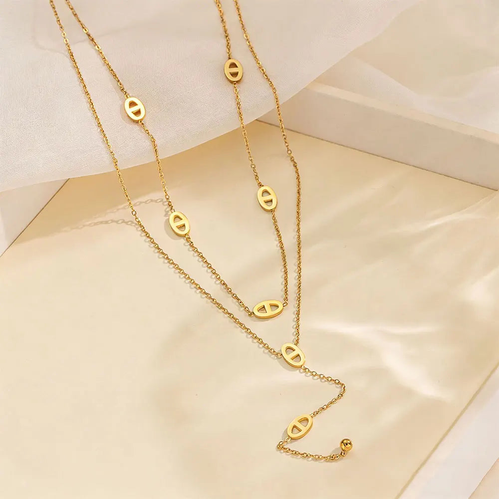 Collier long en Y maillons ovales – Doré