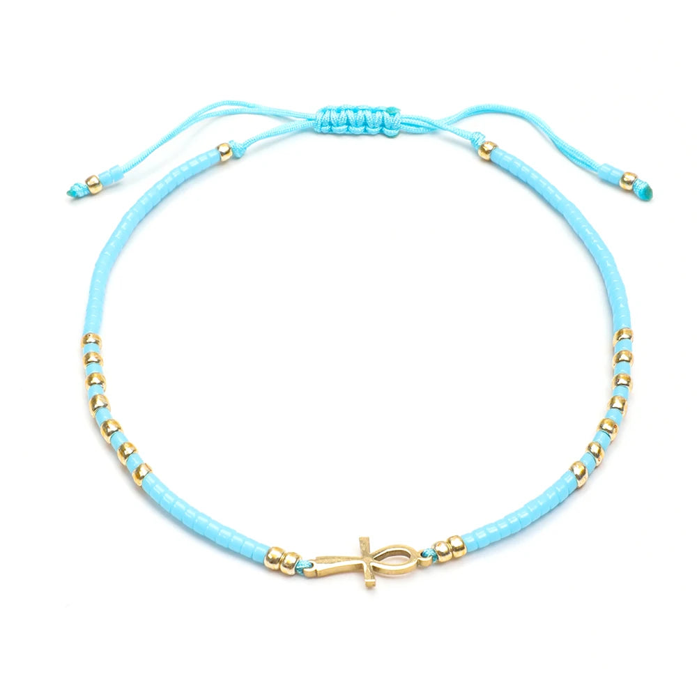 Bracelet fin perles de verre colorées – Bleu clair